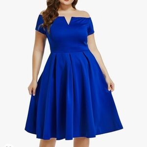 given to me by my neighbor, never worn before tags still on dress